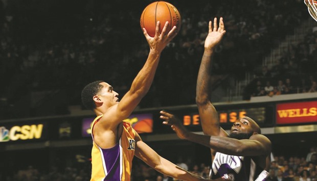 Jordan Clarkson (L) of the Los Angeles Lakers goes up for a shot against Quincy Acy of the Sacramento Kings at Sleep Train Arena in Sacramento on Thursday. Picture: Ezra Shaw/Getty Images/AFP