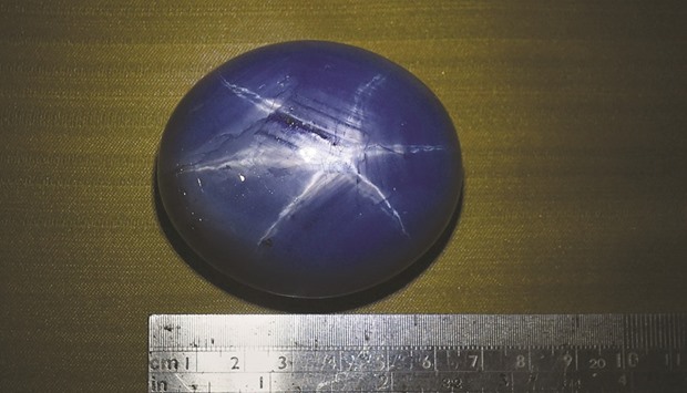 The worldu2019s biggest blue star sapphire, the Lankan Star of Adam, is displayed in Colombo yesterday.
