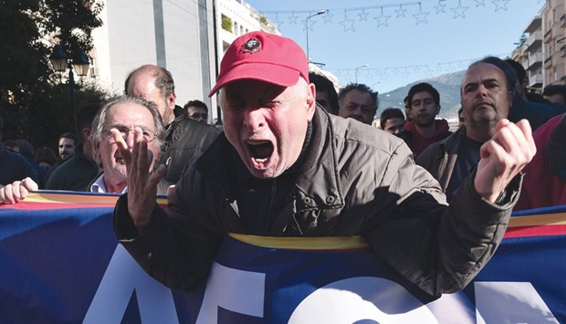 A pensioner breaks down as he marches along with others on their way towards the prime ministeru2019s offices in Athens, during a rally against the reforms that the government has proposed for the new pension plan, as part of measures demanded by countryu2019s creditors.