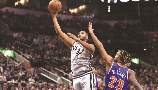San Antonio Spurs center Boris Diaw (33) shoots the ball past New York Knicks power forward Derrick Williams (23) during the first half of their NBA game on Friday. Picture: Soobum Im-USA TODAY Sports