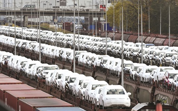 Volkswagen cars are loaded on trains at the truck gate u2018Fallerslebenu2019 at the Volkswagen headquarters in Wolfsburg, Germany. The US Justice Department is suing the German company for up to $46bn for allegedly violating environmental laws u2013 though some legal experts expect the final settlement to be far lower.