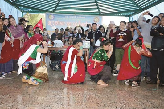 Tamu artists perform a Tamu cultural dance at Shamal Park.