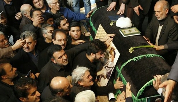Mourners gather around the coffin of former Iranian president Akbar Hashemi Rafsanjani