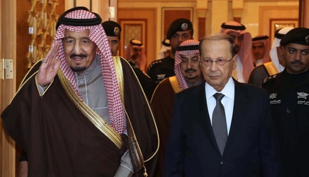 Saudi King Salman bin Abdulaziz Al-Saud (L) and Lebanese President Michel Aoun following a meeting in Riyadh