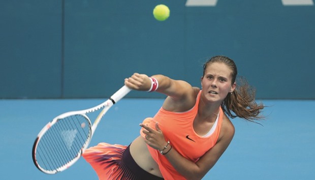 Daria Kasatkina of Russia hits a  serve to Angelique Kerber of Germany in their womenu2019s singles second round match at the Sydney International tournament in Sydney yesterday. (AFP)