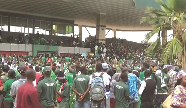 A still from a video showing thousands of supporters of Yahya Jammehu2019s APRC party, wearing the partyu2019s colour green, rallying near the Supreme Court in Banjul yesterday.