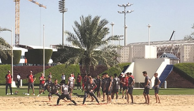 Bayern Munich players train on Aspire Zoneu2019s sand pitches during their winter training camp.