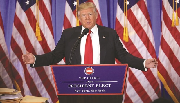 President-elect Donald Trump speaks at a news conference yesterday at Trump Tower in New York City.