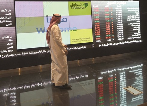 A Saudi investor monitors share prices at the Saudi Stock Exchange, or Tadawul (file).
