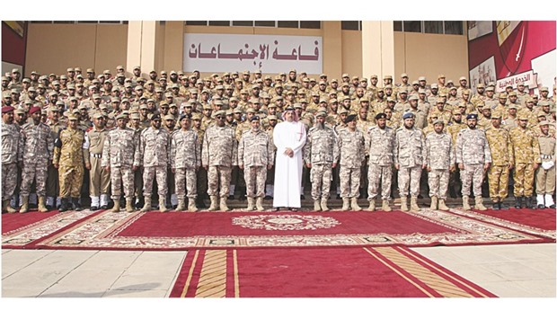 HE the Minister of State for Defence Affairs Dr Khalid bin Mohamed al-Attiyah and HE the Chief of Staff of the Qatari Armed Forces Major General Ghanem bin Shaheen al-Ghanem, and other officials with the 7th batch of National Service recruits.