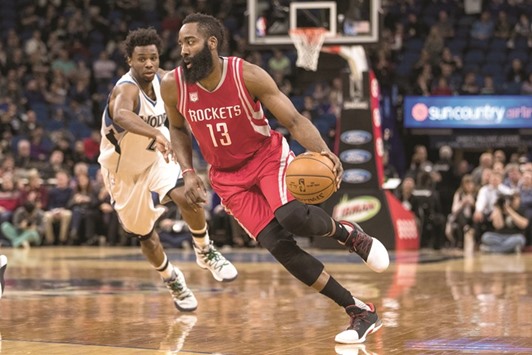 Houston Rockets guard James Harden (13) dribbles past Minnesota Timberwolves forward Andrew Wiggins (22) during the second quarter at Target Center in Minneapolis yesterday. Picture: Brace Hemmelgarn-USA TODAY Sports