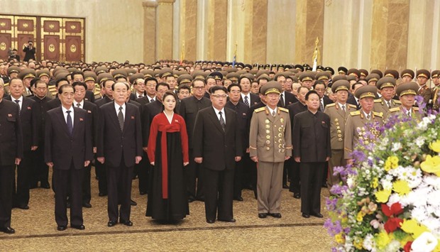 Kim Jong-un and wife Ri Sol-ju visit the Kumsusan Palace of the Sun on New Yearu2019s Day.