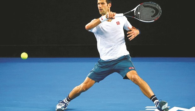 Serbiau2019s Novak Djokovic hits a shot during a training session ahead of the Australian Open.