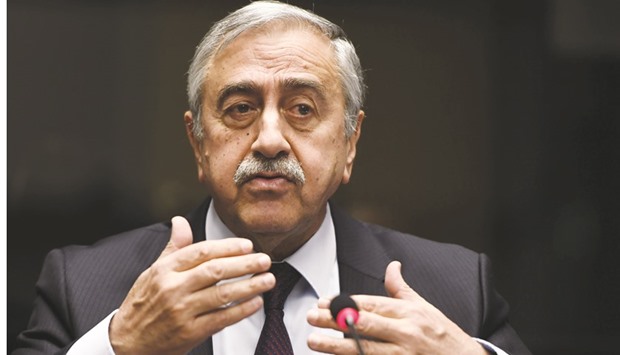 Turkish Cypriot leader Mustafa Akinci gestures as he speaks during a press conference on UN-sponsored Cyprus peace talks yesterday at the Unites Nations headquarters in Geneva.