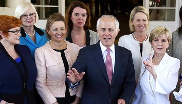 Australian Prime Minister Malcolm Turnbull gestures as he stands with the Minister for Health Sussan Ley (third left) and other ministers in Canberra in this file photo.