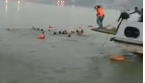 Rescue operations goes on in the river. An image grab from a video posted in social media.