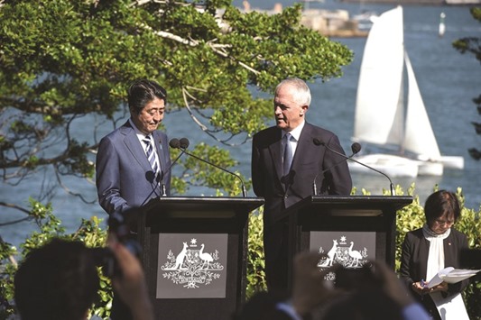 Japanu2019s Prime Minister Shinzo Abe and his Australian counterpart Malcolm Turnbull address a press conference at Kirribilli House in Sydney yesterday.