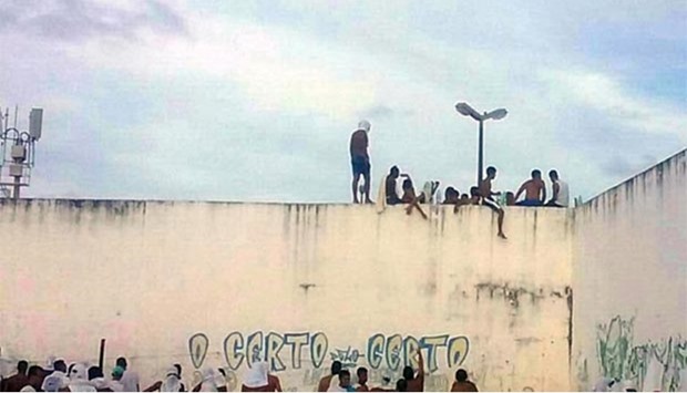 Inmates are pictured at the Alcacuz Penitentiary Centre near Natal, Rio Grande do Norte state in northeastern Brazil, during a prison riot.