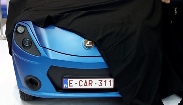 The electric ECAR car is unveiled at the European Motor Show in Brussels, Belgium, on Friday.
