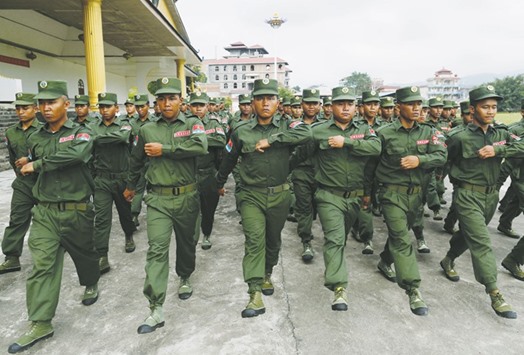 United Wa State Army (UWSA) soldiers march during a display for the media in Pansang, Wa territory in north east Myanmar.