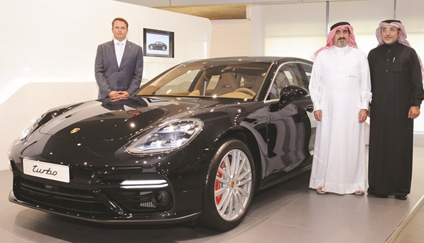 The second generation Panamera Turbo presented at the launch event in Qatar yesterday by Salman Jassem al-Darwish and other officials. PICTURE: Nasar T K.