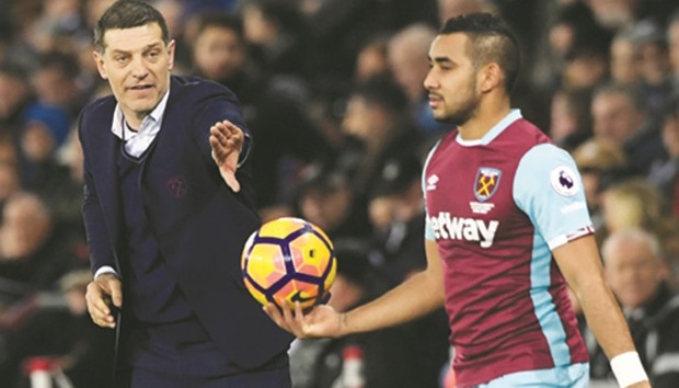 Dimitri Payet was left out of West Hamu2019s 3-0 victory against Crystal Palace after informing manager Slaven Bilic (left) that he wishes to leave the club.