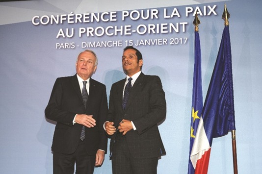 HE the Foreign Minister of Qatar Sheikh Mohamed bin Abdulrahman al-Thani is welcomed by his French counterpart Jean-Marc Ayrault as he arrives for the Mideast peace conference in Paris yesterday.