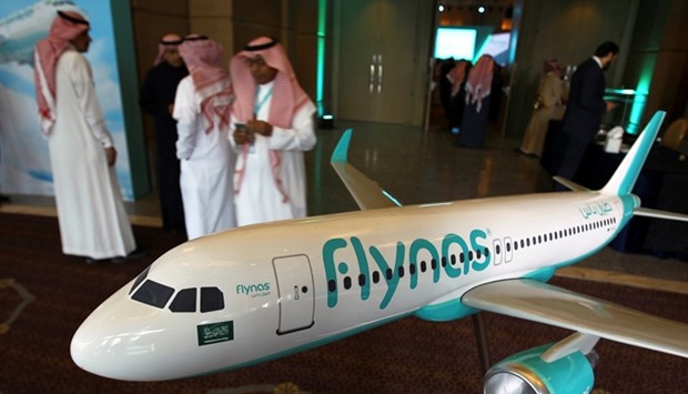 A model of Saudi airline Flynas is on display during a ceremony to sign a deal between Airbus andFlynas in Riyadh.