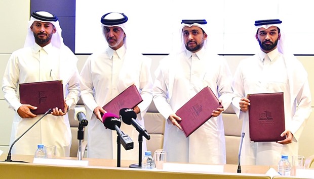 Aspire Zone's Mohamed Khalifa al-Suwaidi, QFA's Sheikh Hamad bin Khalifa bin Ahmed al-Thani, QU's Dr Hassan al-Derham and SC's Hassan al-Thawadi at the ceremony at QU.
