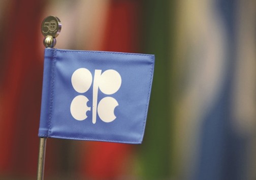 An Opec flag is seen during a presentation of World Oil Outlook in Vienna. Although stabilising oil prices and policy responses to date may assist in containing further erosion in the sovereign creditworthiness, Moodyu2019s says the GCC countries would continue to face headwinds from subdued economic growth, increasing fiscal and structural reform fatigue, and persistent oil price volatility.