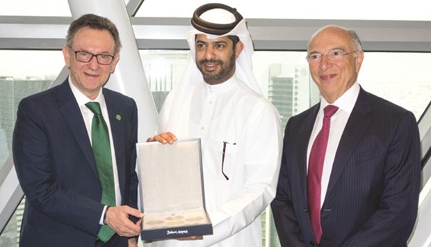 Chapecoense chief Plinio David de Nes Filho with SC Assistant Secretary General for Tournament Affairs, Nasser al-Khater