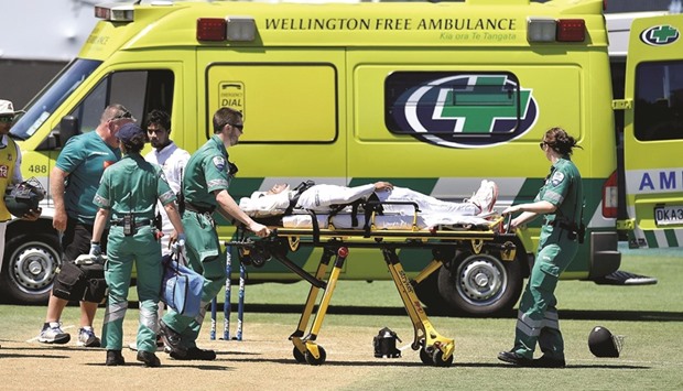 Bangladeshu2019s Mushfiqur Rahim is carried away by ambulance staff after being hit on the head at the Basin Reserve in Wellington yesterday.