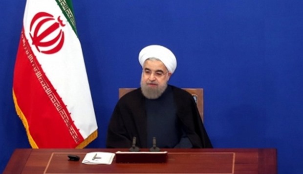 Iran's President Hassan Rouhani attends a news conference in Tehran