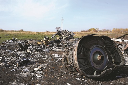 This file photo taken on October 15, 2014 shows the wreckage of Malaysia Airlines flight MH17 near the village of Rassipnoe. Ukraine has filed a case at the UNu2019s top court accusing Russia of sponsoring u2018terrorismu2019 and demanding Moscow pay damages for the shelling of civilians and the downing of flight MH17, the court said yesterday.