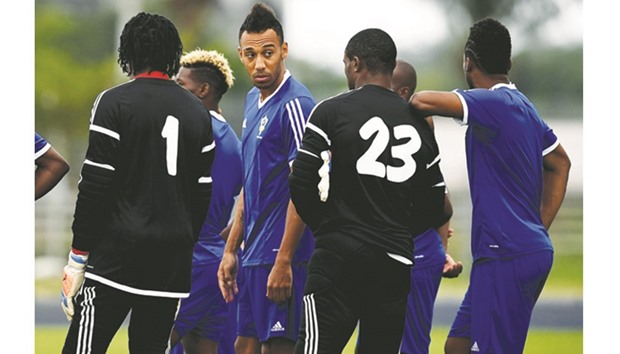 Gabonu2019s forward Pierre-Emerick Aubameyang (centre) takes part in a training session with his teammates in Libreville ahead of their match against Burkina Faso. (AFP)