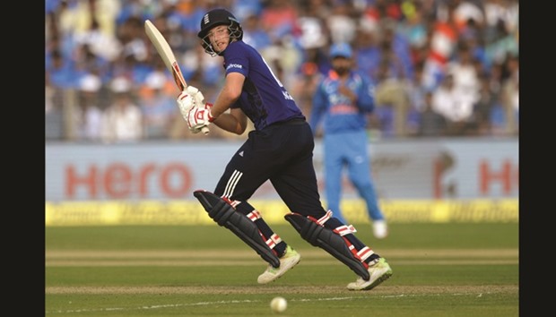 England batsman Joe Root plays a shot during the first ODI against India at The MCA International Cricket Stadium in Pune. (AFP)