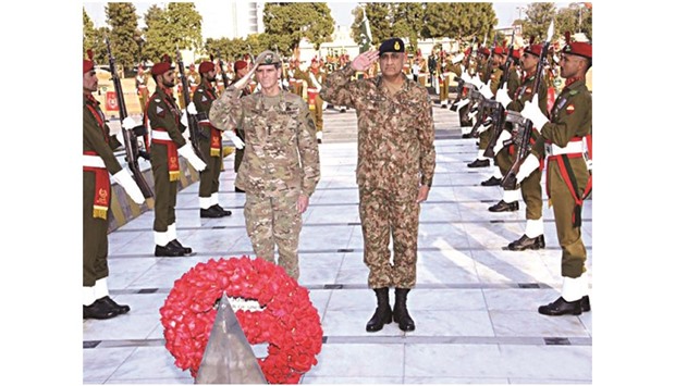 US General Joseph Votel, accompanied by Pakistan Army Chief General Qamar Javed Bajwa, paying homage to martyrs of the anti-terror war at u201cYadgar-e-Shuhadau201d (martyrs monument).