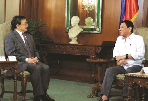 President Rodrigo Duterte holds talks with Chinau2019s Vice Foreign Minister Liu Zhenmin during his courtesy call at the Malacanang presidential palace in Metro Manila yesterday.