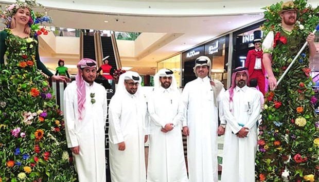 QDB and QTA officials visit some of the pop-up shops at the Mall of Qatar yesterday. PICTURE: Joey Aguilar
