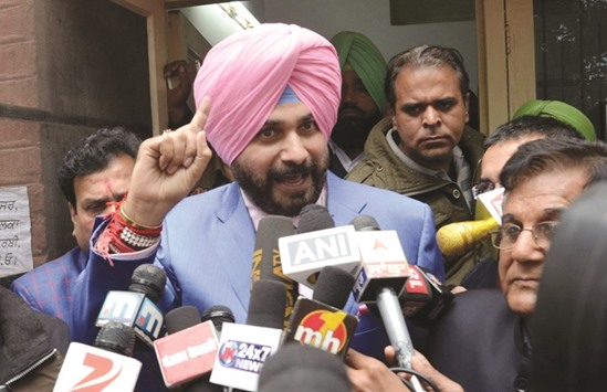 Congress leader Navjot Singh Sidhu speaks to reporters after filing his nomination papers in Amritsar yesterday.