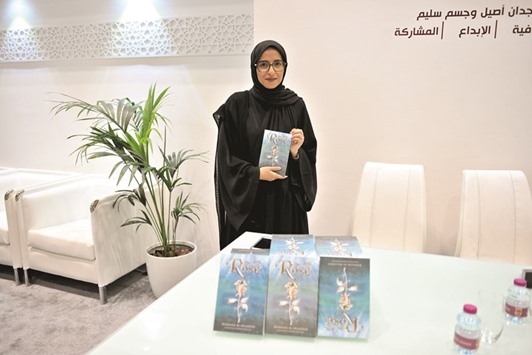 STORY-TELLER: Kummam al-Maadeed during the launch of her new book at the 27th Doha International Book Fair.