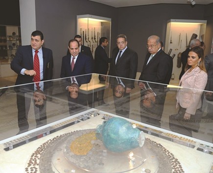 A handout picture released by the Egyptian Presidency yesterday shows Egyptian President Abdel Fattah al-Sisi attending the reopening of the Museum of Islamic Art in the capital Cairo, following the restoration of the museum that was damaged in a bomb explosion.
