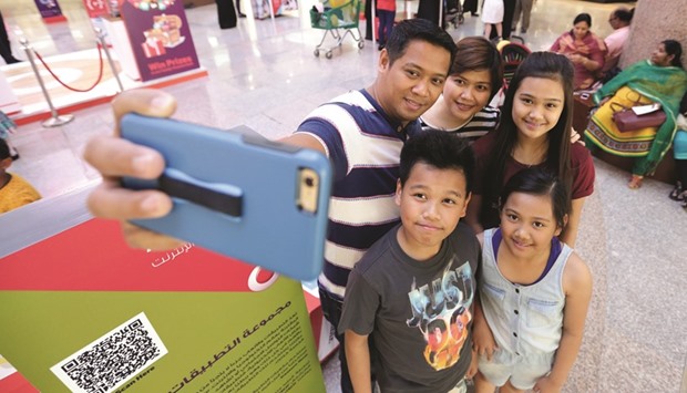 Qatar residents participating in Vodafone Qatar's Treasure Hunt activity last year.