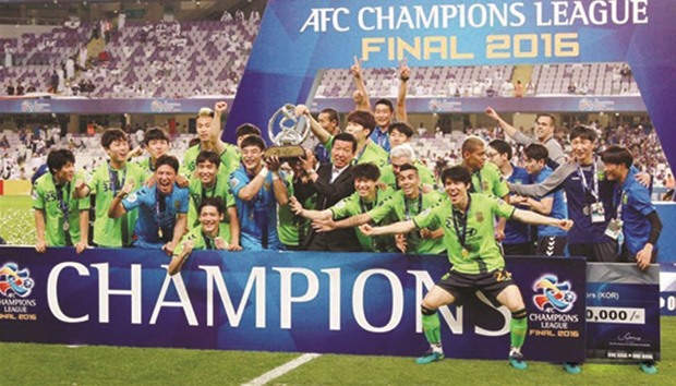 Jeonbuk Hyundai players celebrate after winning the AFC Champions League last year, but have been disqualified from this yearu2019s tournament.