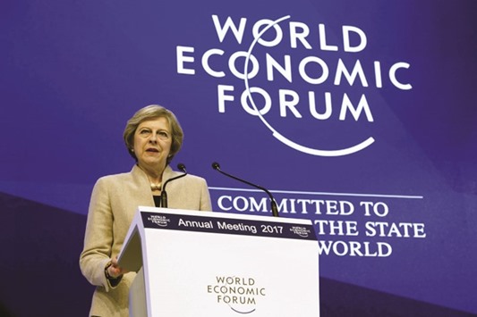 British Prime Minister Theresa May delivers a speech on the third day of the World Economic Forumu2019s annual meeting yesterday. u201cThe UK will step up to a new leadership role as the strongest and most forceful advocate for business, free markets and free trade anywhere in the world,u201d May said.