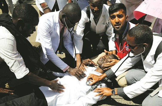 Student doctors perform a drill during a strike in Nairobi.