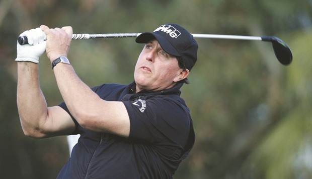 Fan favourite Phil Mickelson, who had surgeries for a hernia last year, marks his return to competition with five birdies and a lone bogey for a four-under 68. (AFP)