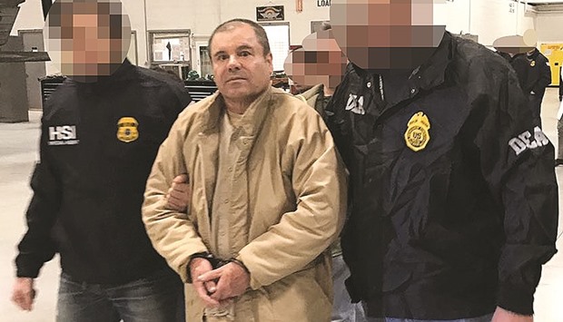 Joaquin Guzman Loera aka u2018El Chapou2019 Guzman is escorted by Mexican police as he is extradited to the US.