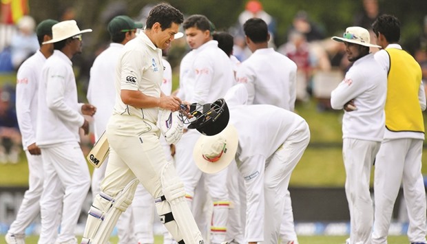Bangladesh players celebrate the dismissal of New Zealand batsman Ross Taylor during the second dayu2019s play of the second Test at Hagley Park Oval in Christchurch yesterday. (AFP)