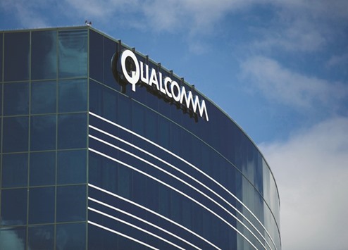 One of many Qualcomm buildings is shown in San Diego. Apple on Friday sued Qualcomm, accusing the California chipmaker of abusing its market power to demand unfair royalties, echoing charges filed days earlier by US antitrust regulators.